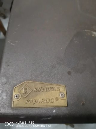 Estufa de leña hierro con puerta cristal