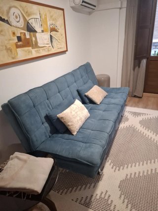 Sofá Cama Azul Tela y Metal.