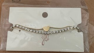 Pulsera dorada con corazón y circonitas