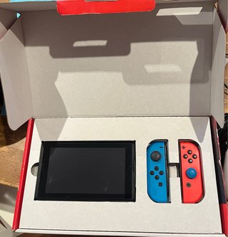 Nintendo Switch + mando + juegos