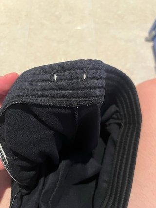 Pantalones de chándal Nike negros con logo rojo
