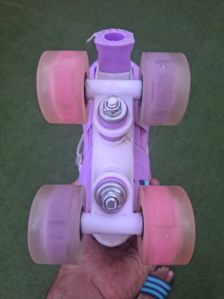 Patines 4 Ruedas Niña Morado/Rosa. Talla 26-29