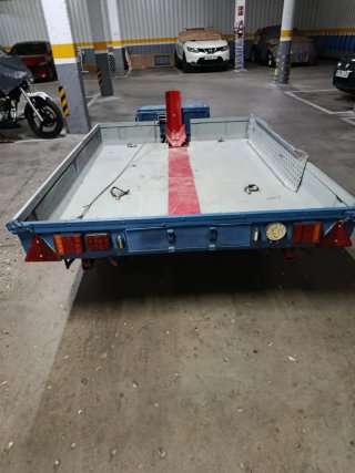 Remolque para moto azul y rojo