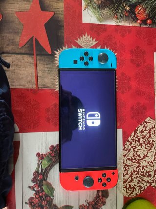 Nintendo Switch OLED + 5 Juegos + Mando Pro