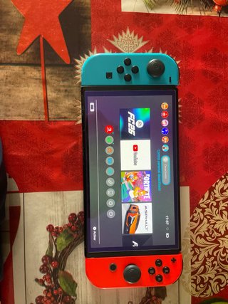 Nintendo Switch OLED + 5 Juegos + Mando Pro