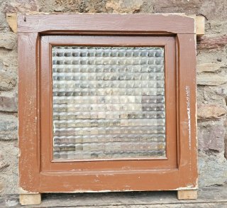 Marco de ventana de madera con cristal