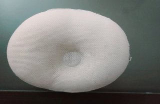 Almohada de bebe para plagiocefalia
