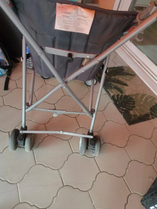 Silla de paseo infantil roja y gris