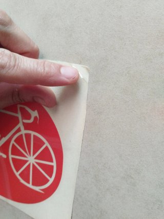Pegatina Bici naranja Ovalada