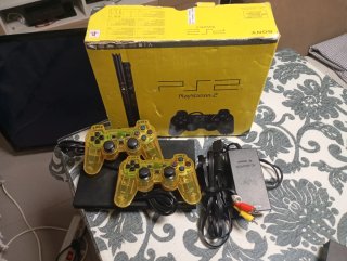 PS2 Slim con Accesorios, funciona perfectamente.