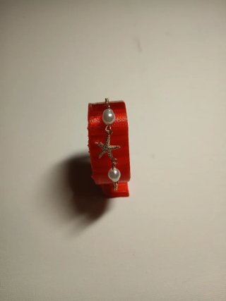 Pulsera dorada con perlas y estrella de mar