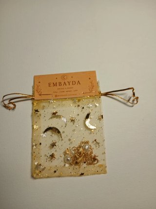 Pulsera dorada con perlas y estrella de mar