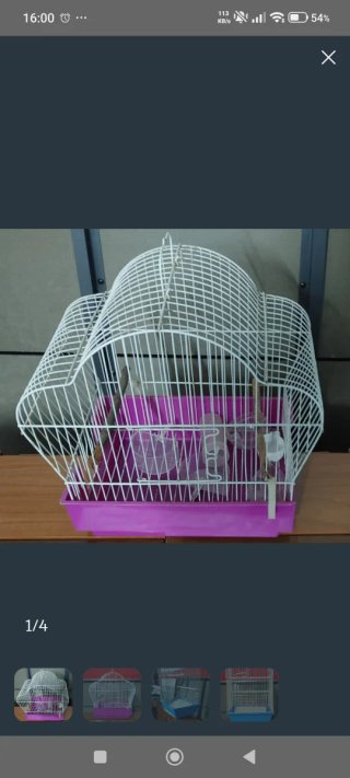 Jaula para pájaros blanca y rosa