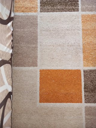 Alfombra Nilo de tela con diseño de cuadrados