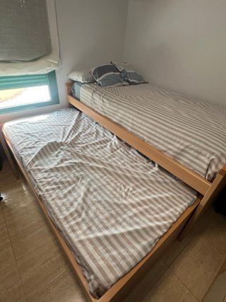 Cama nido con cajones y estantería