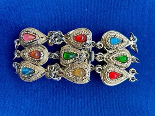 Pulsera brazalete dorada y piedras multicolor