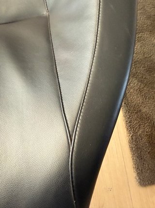 Sillón diseño piel negra y acero cromado