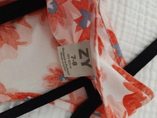 Vestido niña floral blanco y naranja