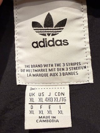 Chaqueta Adidas Negra con Rayas Blancas