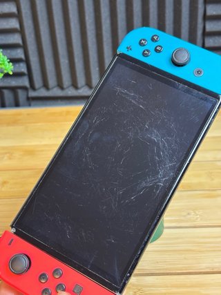 Nintendo Switch OLED + Accesorios