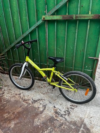 Bicicleta infantil Btwin amarilla