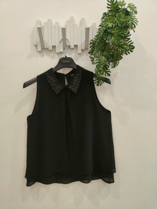 Elegante camicetta smanicata nera