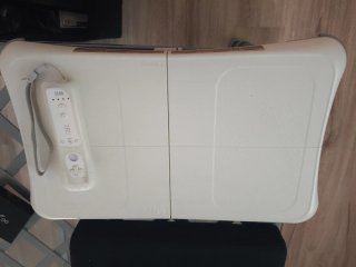 Mando Wii con funda y tabla