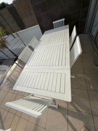 Mesa Exterior extensible blanca con 9 sillas