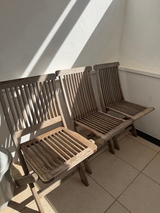 Mesa Exterior extensible blanca con 9 sillas
