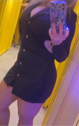 Mono blazer negro con botones joya