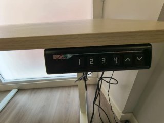 Escritorio elevable eléctrico y silla giratoria