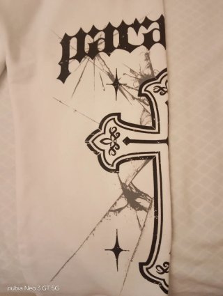 Pantalón chándal blanco con cruces negras