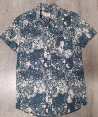 Camisa chico manga corta estampada con bolsillo
