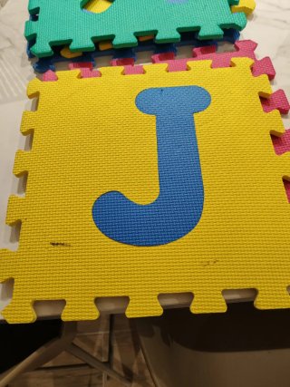 Alfombra puzzle letras y números