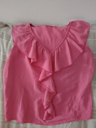 Blusa sin mangas con volantes