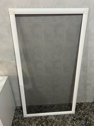 Mosquitera blanca para ventana