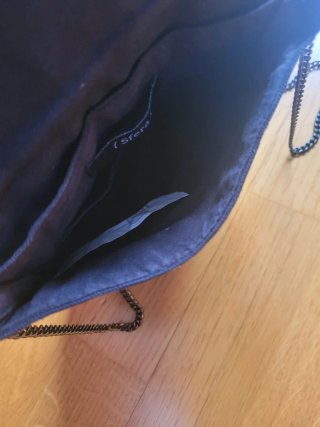 Bolso Sfera negro y dorado con cadena
