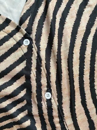 Blusa sin mangas con estampado de rayas