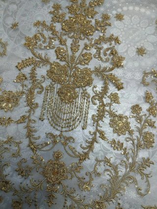 Manteletas de fallera en oro a estrenar