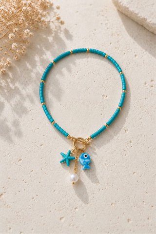 Collar Turquesa con Colgantes de Pez y Estrella