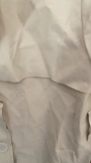 Gabardina blanca con forro verde