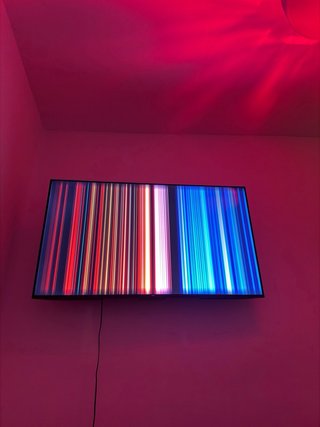 TV TCL 55” 4K Google TV con base para pared nueva