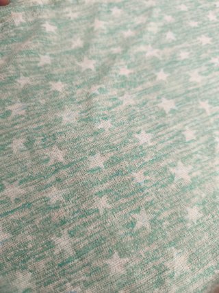 Blusa azul claro con estrellas