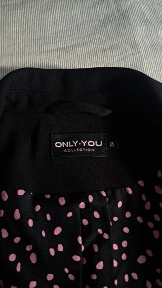 Americana negra con forro estampado