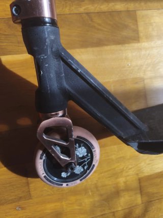 Patinete freestyle negro y cobre