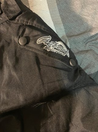 Pantalón de moto con tirantes