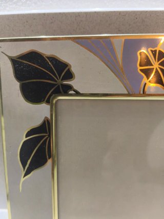 Cornice portafoto decorata con fiori