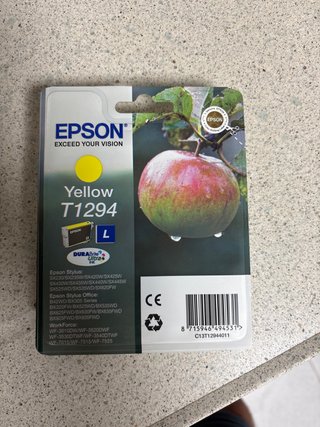 Tinta Epson T1294 Amarilla, cian y negro