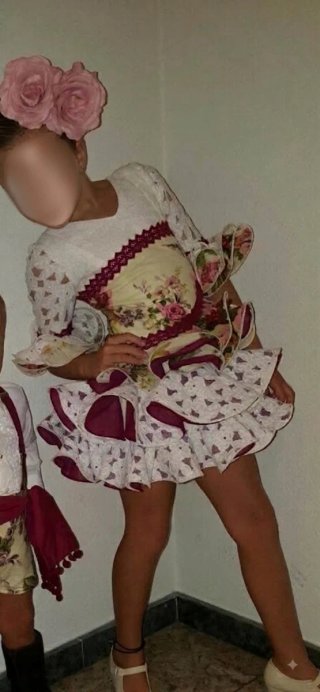 Traje de flamenca rosa y blanco
