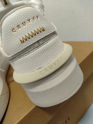 Zapatillas Cruyff Blancas y Doradas